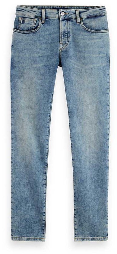 Blauwe skinny jeans met lach-effect, button fly.