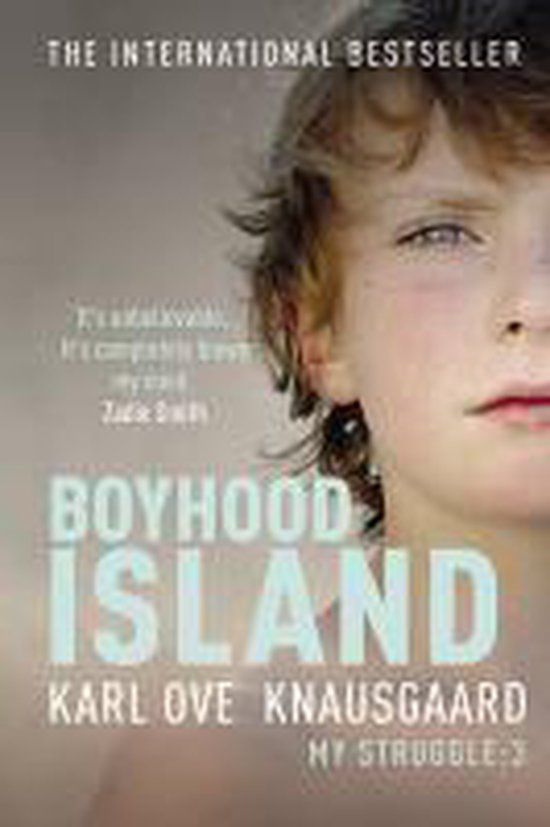 Boek "Boyhood Island" met close-up van een jongen.