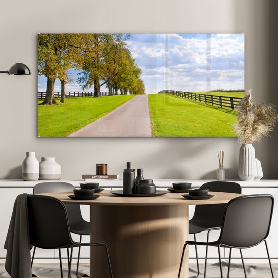 MuchoWow® Glasschilderij 120x60 cm - Schilderij acrylglas - Wolken - Bomen - Weg - Foto op glas - Schilderijen