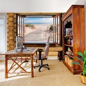 Fotobehangkoning - Behang - Vliesbehang - Fotobehang - Uitzicht op het Strand door het Raam - 3D - 150 x 105 cm