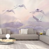 Fotobehangkoning - Behang - Vliesbehang - Fotobehang Zwanen - Wolken - Flying Swans - 350 x 245 cm