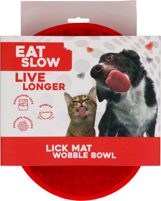Verpakking met de tekst 'EAT SLOW LIVE LONGER LICK MAT WOBBLE BOWL' met een rode lick mat.
