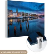 MuchoWow® Glasschilderij 160x120 cm - Schilderij acrylglas - Lübeck in de ochtend - Foto op glas - Schilderijen