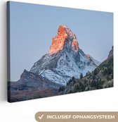 Canvas Schilderij De Matterhorn in Zwitserland bij zonsopkomst - 120x80 cm - Wanddecoratie