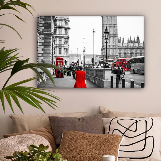Photo Zwart et blanc d'une femme en robe rouge Toile 90x60 cm - Tirage photo sur toile (Décoration murale salon / chambre)