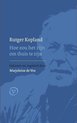 Boek "Hoe zou het zijn om thuis te zijn" van Rutger Kopland, met portret van de schrijver.