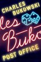 Néon "Charles Bukowski Post Office" avec des dés en lumière bleue.