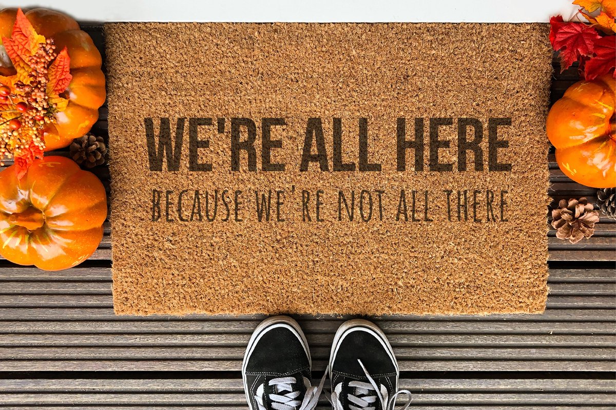 Laser Point We Are All Here Because We Are Not All There | 60x40 cm | Nieuwe huis cadeau | Ingangsmat | Deurmat met stijl | Verhuizing cadeau | Praktisch & trendy | Perfect voor binnenkomst | Cadeau voor nieuwe woning Bruin | Zwart (Gravering 60x40)