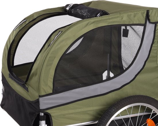 Detail van de voorkant van een groene fietskar met mesh ramen en reflecterende randen.