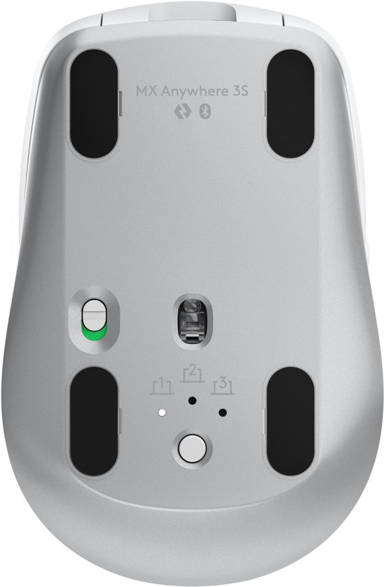 Onderkant van een lichtgrijze Logitech MX Anywhere 3S muis met vier zwarte glijvlakken, een aan/uit-schakelaar en pairing knoppen.