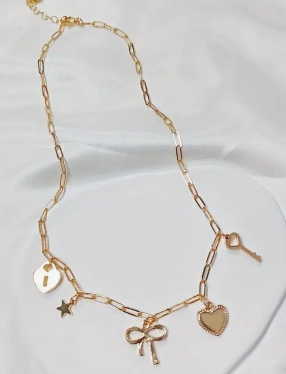 bedel ketting - heart bow charm necklace - strik bedel ketting - collier - stainless steel - kleur goud