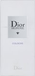 Dior Homme Cologne verpakking. Witte doos met zilveren label, blauwe tekst 'COLOGNE' en een bij.