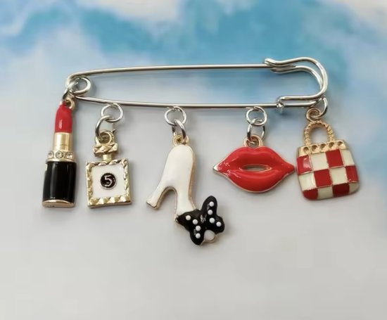 Foto: Broche maks up bedels