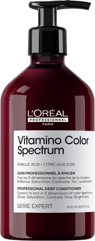 Bouteille rouge foncé avec distributeur à pompe L'Oréal Professionnel Vitamino Color Spectrum. Contient de l'acide férulique + acide citrique 2.5%.