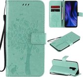 Voor Xiaomi Redmi 9 Boom & Kat Reliëfpatroon Horizontale Flip Leren Case met Houder & Kaartsleuven & Portemonnee & Lanyard (Groen)