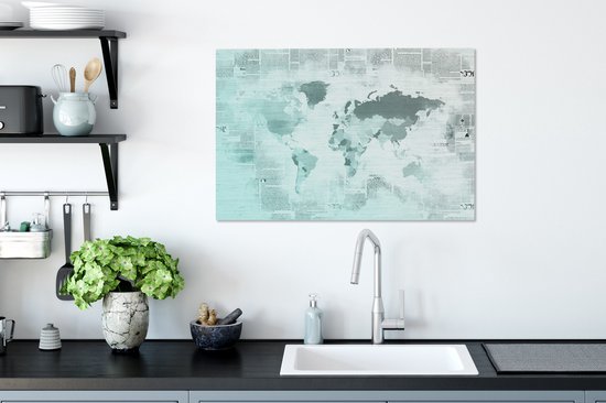 Wereldkaart aux couleurs bleu clair sur fond de papier journal 60x40 cm