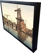 Oud Stadsgezicht Haarlem - Molen De Adriaan en Brug - Oude Foto Print op Canvas Doek 90x60cm in zwarte houten baklijst