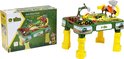 De John Deere boerderij speeltafel naast de verpakking, beide met afbeeldingen van tractoren en dieren.