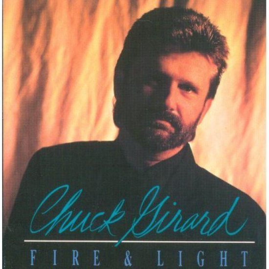 Chuck Girard op de albumhoes Fire & Light.