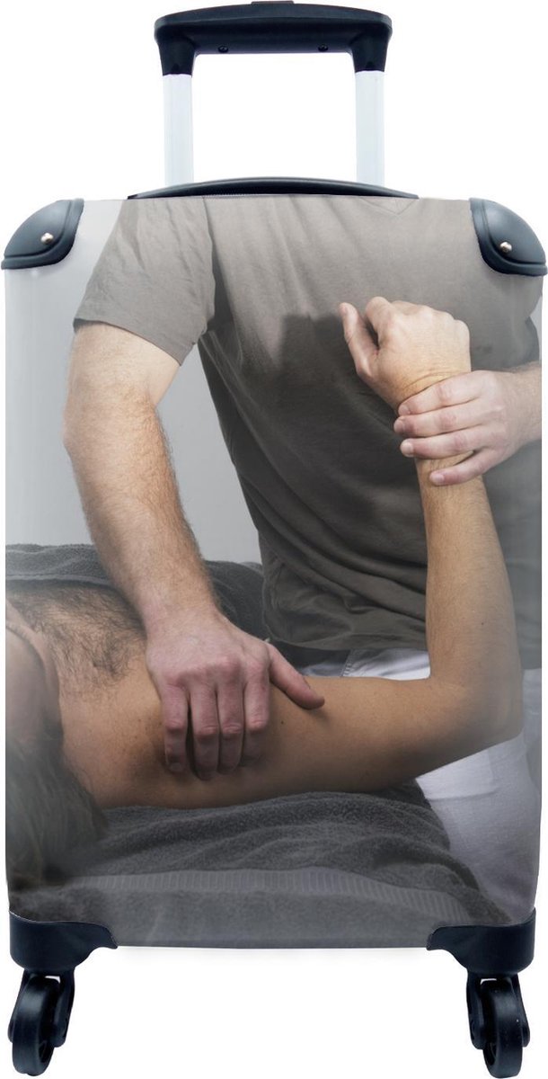 Valise - Un kiné donne un massage à un bras - 35x55x20 cm - Bagage