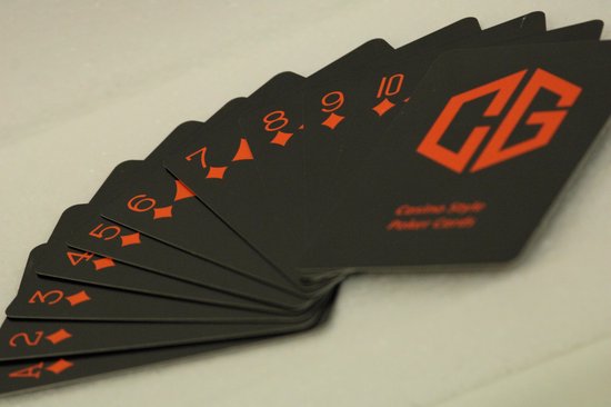 Thumbnail van een extra afbeelding van het spel Luxe poker kaarten - Poker - 4 x Kaarten -  4 sets - Cave & Garden - Speel kaarten - Oranje - Zwart - Kaartspel - Professionele kaarten -