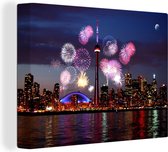 Canvas Schilderij Vuurwerk boven het Canadese Toronto tijdens de nacht - 80x60 cm - Wanddecoratie