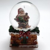 Boule à neige noeud de cheminée avec cadeau et sapin de Noël 9cm de haut