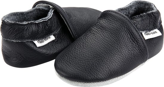 Zwarte leren babyslofjes met klittenbandsluiting en grijze voering.