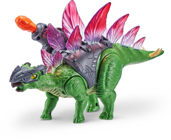 Groene Stegosaurus speelgoed dinosaurus met rode en paarse rugplaten, grijze harnas en oranje kanon.