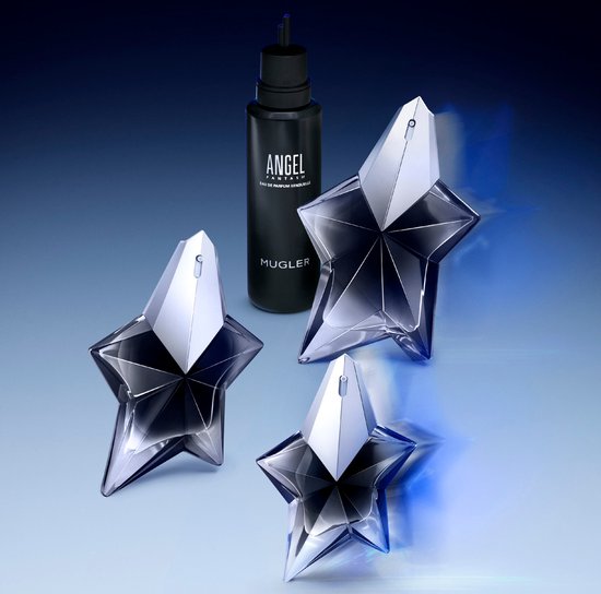 Zwarte navulfles van Mugler Angel Fantasm naast drie stervormige parfumflacons.