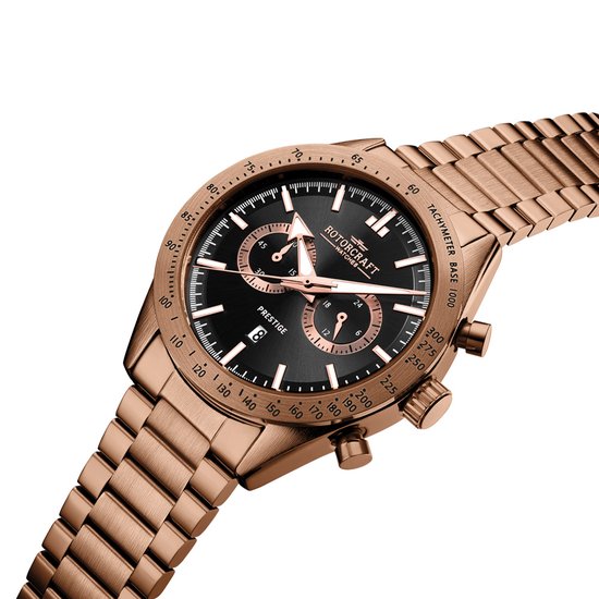 Rosegouden Rotorcraft horloge met zwarte wijzerplaat, tachymeter en datumaanduiding.