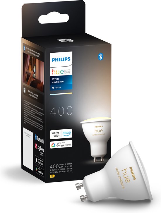Verpakking van Philips Hue White Ambiance GU10 lampen, met een losse lamp ernaast.