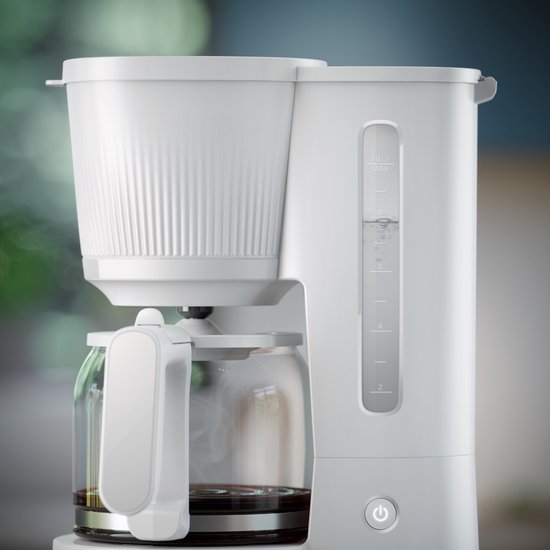 Cafetière Philips blanche avec verseuse en verre, indicateur de niveau d'eau et bouton marche/arrêt.