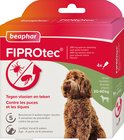 Beaphar FIPROTec doos met rode en roze opdruk. Bevat een grote bruine hond. 268 mg oplossing voor grote honden, 20-40kg. Tekst: Tegen vlooien en teken.