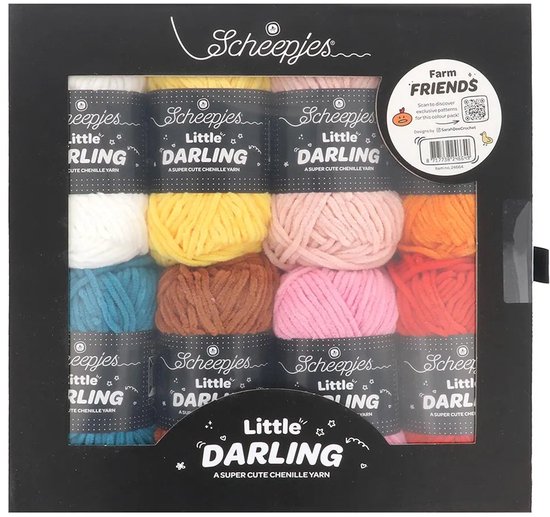 Boîte de fil Scheepjes Little Darling, avec 12 pelotes de couleurs dont blanc, jaune, rose, orange, bleu, marron et rouge.