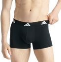 Zwarte Adidas boxershorts met elastische band met witte strepen, model draait zich om.