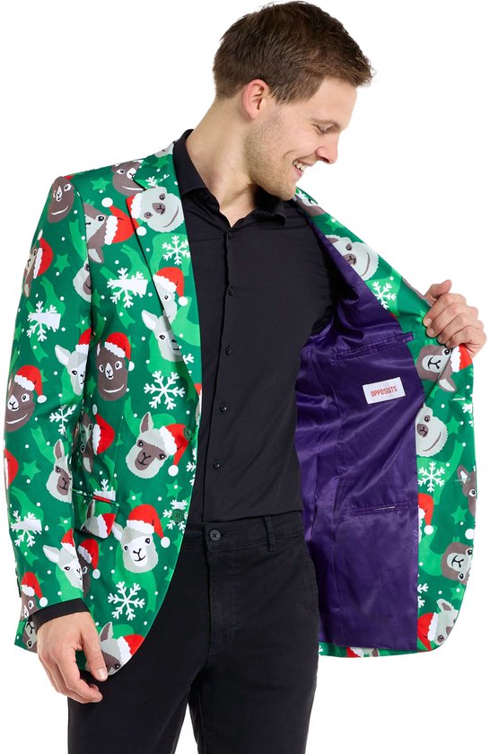 Groene blazer met kerstprint van lama's, openvallend om paarse voering te tonen.