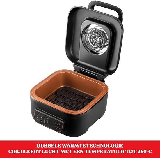 Open zwarte Russell Hobbs multicooker met koperkleurige binnenkant, grillrek en dubbele warmtetechnologie tot 260°C.