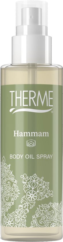 Groene fles met witte opdruk 'THERME Hammam BODY OIL SPRAY' en witte bloemenpatronen.