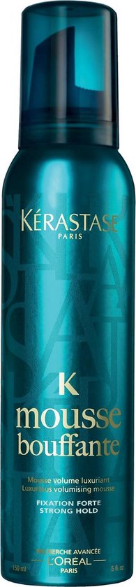 Kérastase Mousse Bouffante volumemousse in een glanzende blauwe spuitbus.