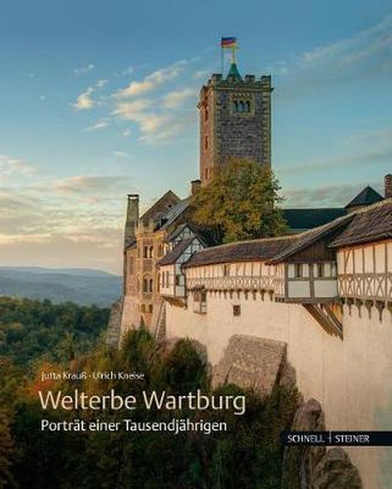 Boek 'Welterbe Wartburg' met een afbeelding van de Wartburg, een kasteel op een heuvel.