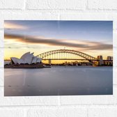 Muursticker - Zonsondergang achter de Brug in Sydney, Australië - 40x30 cm Foto op Muursticker