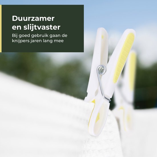 Twee witte en gele wasknijpers met metalen veer, "Duurzamer en slijtvaster".