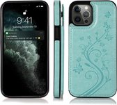 Hoesje geschikt voor iPhone 15 - Backcover - Pasjeshouder - Portemonnee - Bloemenprint - Kunstleer - Turquoise