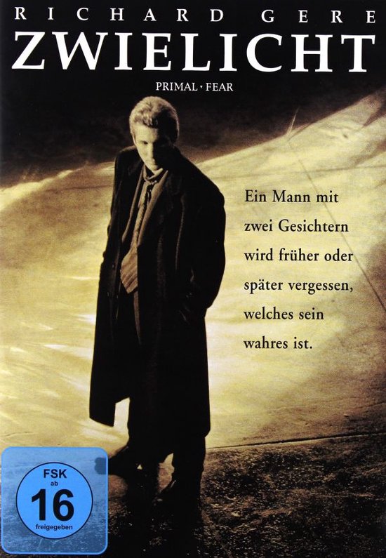 Richard Gere staat in een lange jas op een donker, rokerig pad, met de titel "Zwielicht".