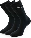 Drie zwarte PUMA sportsokken met wit logo.