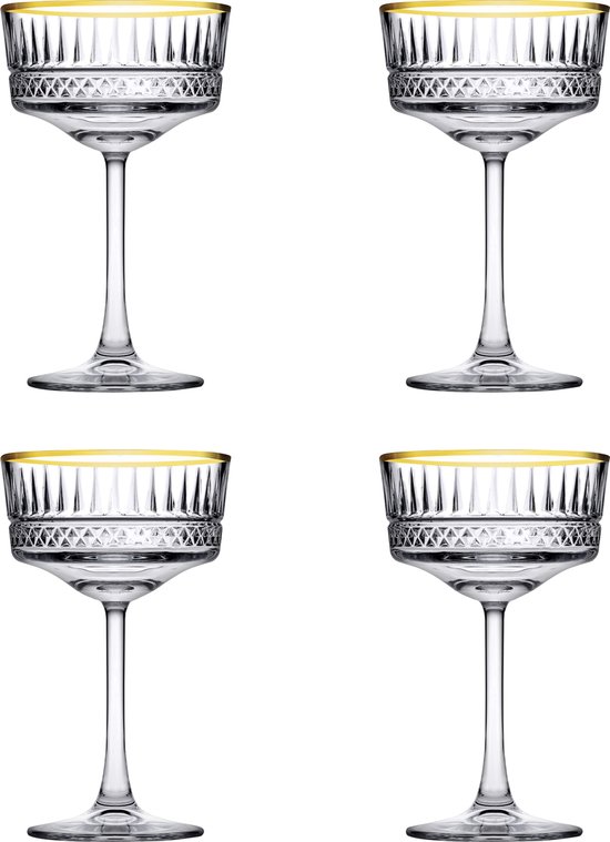 Quatre coupes à champagne transparentes à bord doré et côtes verticales.