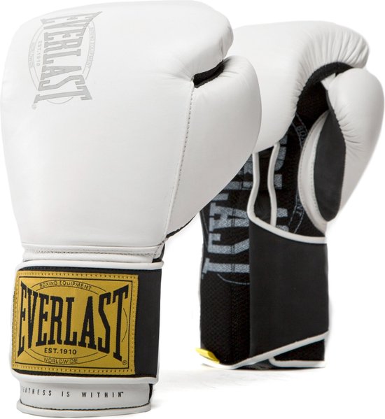 Witte leren bokshandschoenen met Everlast logo, gele band met 'BOXING EQUIPMENT EST. 1910 WORLDWIDE' en 'GREATNESS IS WITHIN'.