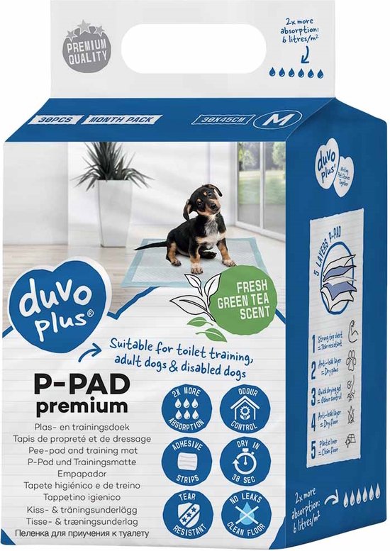 Doos met Duvo+ P-Pad premium plas-onderleggers, met puppy en groene thee geur.