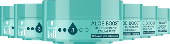 Rij van groene Taft Aloe Boost styling paste potten op een witte achtergrond.